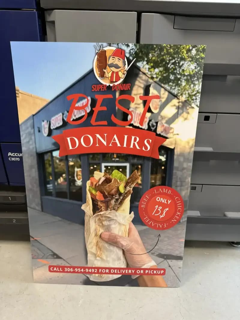 Outdoor storefront vinyl banner printed for Best Donairs, Saskatoon