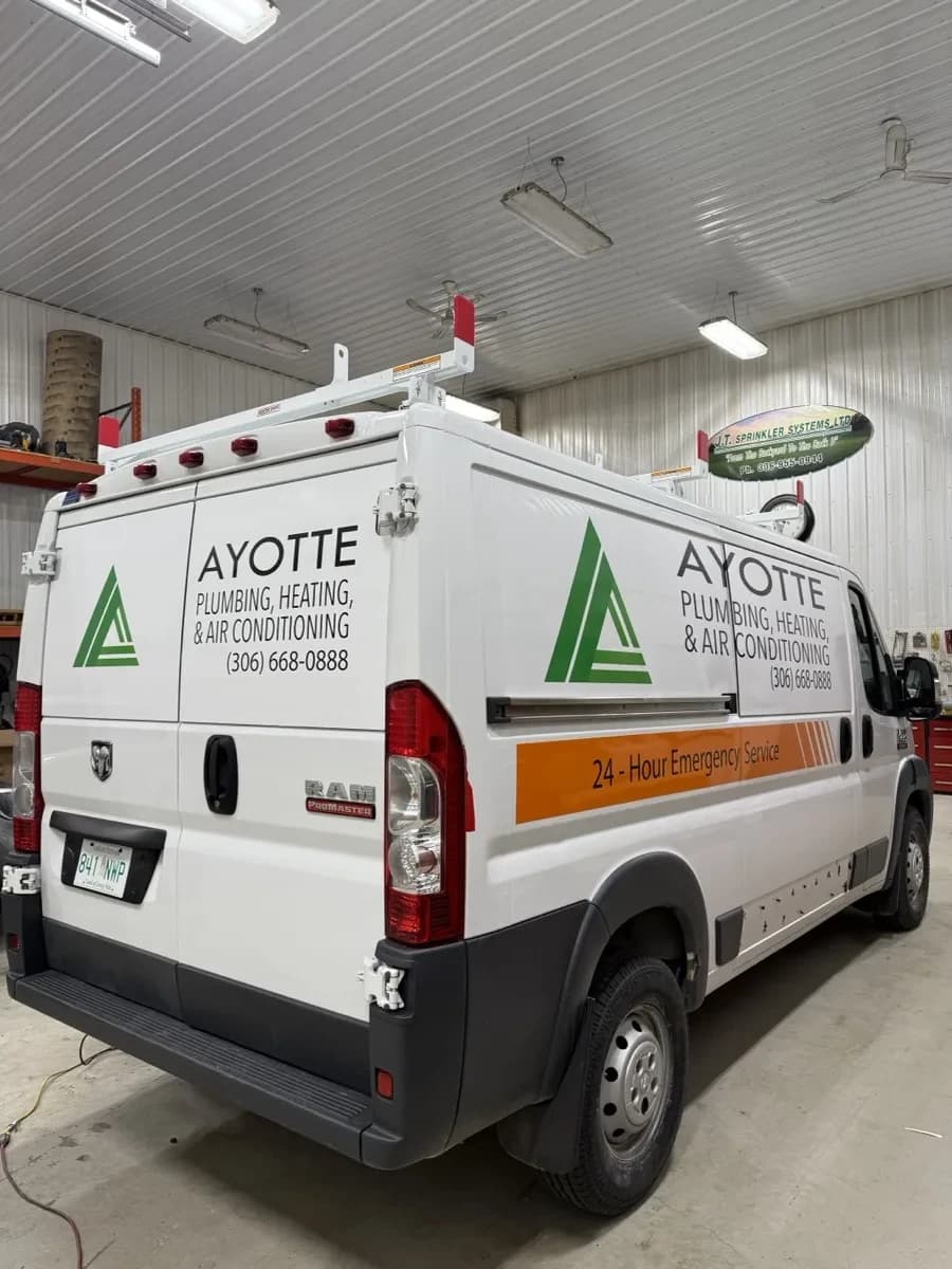 Van vinyl branding for Ayotte Plumbing, printed by True Color Saskatoon
